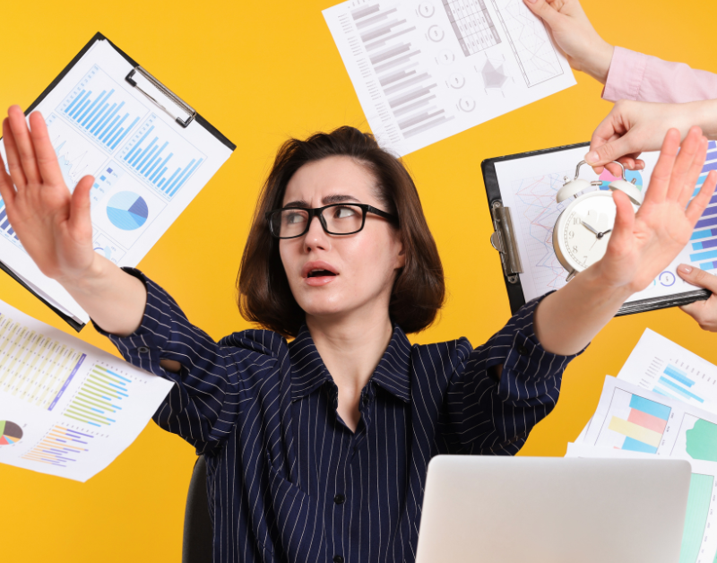 woman overwhelmed by busy responsibilities