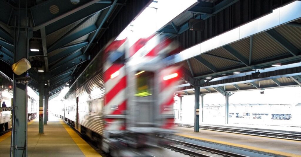 Metra train heading into train stop