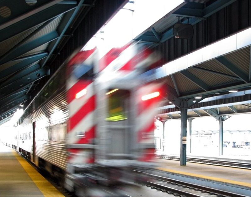Metra train heading into train stop