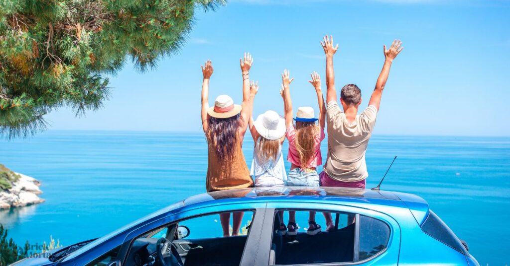 family saying good bye to their beach vacation and getting. ready to get back to work after vacation