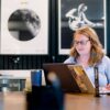 two brick and mortar members taking control of their workday and meeting in our collab room