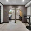 Flexible coworking workstations and shared seating area at Brick & Mortar.